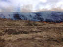 Fire advancing down the slope